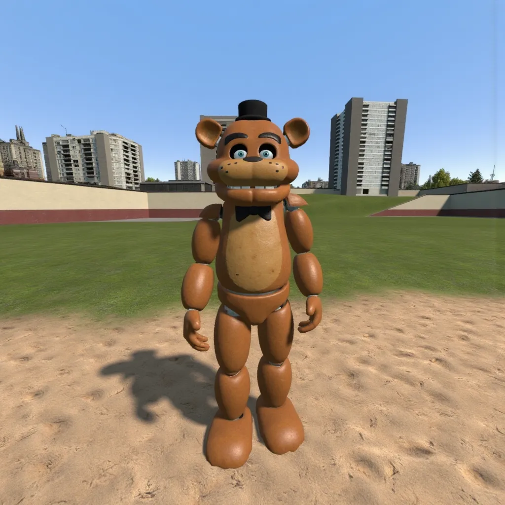 gm_construct, a scene from the video game "Garry's Mod" featuring a virtual urban landscape. The image shows an open area with a mix of grass and sand in the foreground, bordered by modern buildings in the background. The sky is clear and blue, and the environment appears to be part of a digital sandbox setting. Splinks Freddy: A stylized animatronic bear character with brown fur, blue eyes, and a friendly expression. It features jointed limbs, it has white joints, giving it a segmented appearance. The bear is wearing a small black bow tie, and a black tophat. It's very tall.