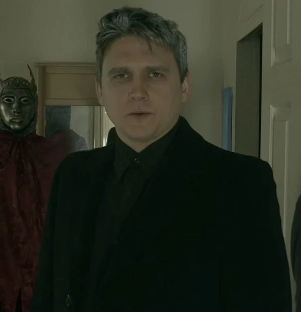 Father John (Uncle Samsonite)