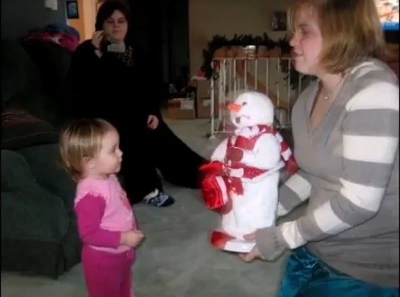 Red peppermint spinning snowman